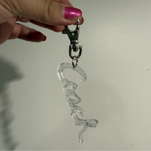 Coach Handbags - SOLD Coach clear glitter script hangtag charm poppy